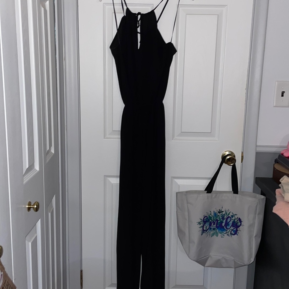 Strapy black candies jumpsuit.